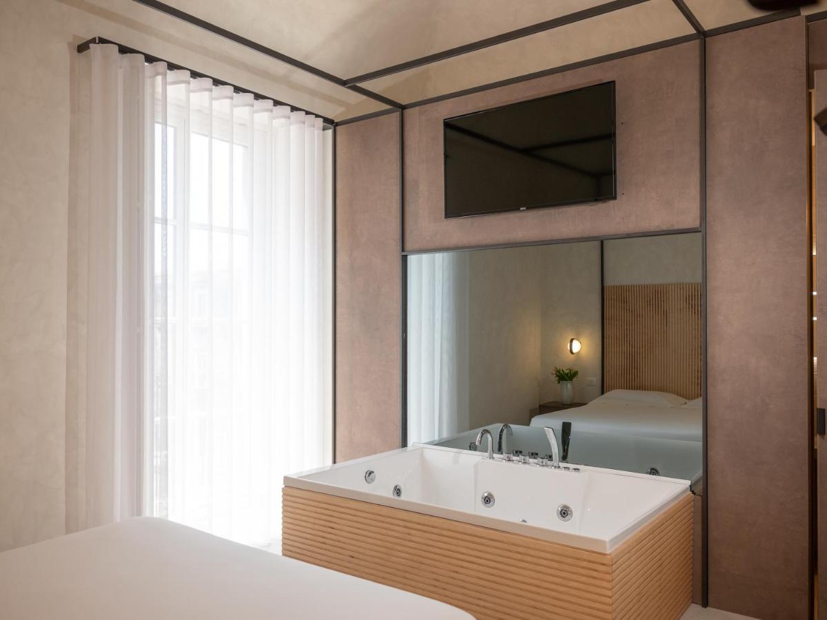 Chambre Quadruple avec Baignoire